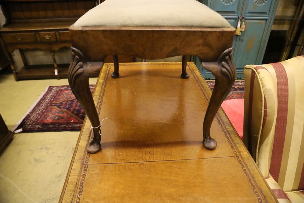 A Queen Anne style walnut dressing stool, width 70cm, depth 52cm, height 48cm